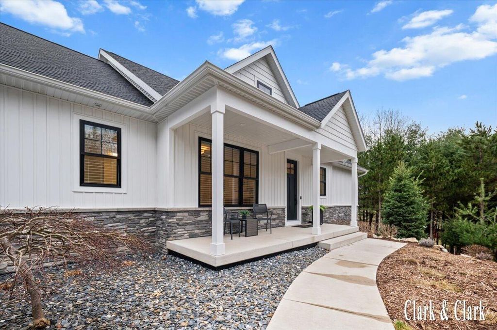 Photo of 10660 Kissing Ridge Drive SE, Lowell, MI 49331 (MLS # 26009939)