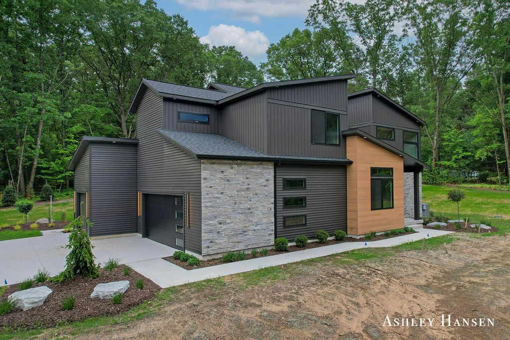 Photo of 8332 Ramsdell Drive NE, Rockford, MI 49341 (MLS # 25052041)