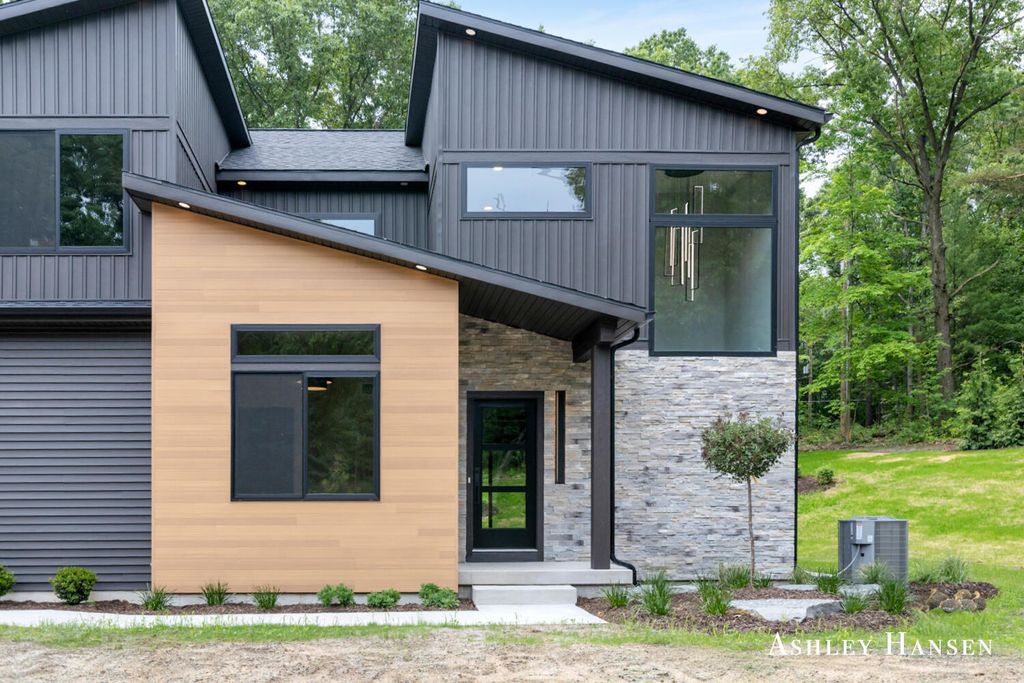 Photo of 8332 Ramsdell Drive NE, Rockford, MI 49341 (MLS # 25052041)