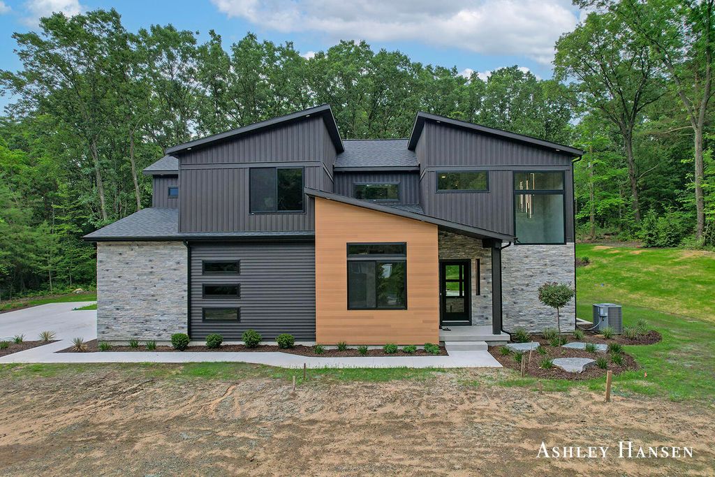 Photo of 8332 Ramsdell Drive NE, Rockford, MI 49341 (MLS # 25052041)