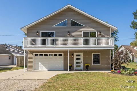 Photo of 517 Pine Street, Ferrysburg, MI 49409 (MLS # 25050014)