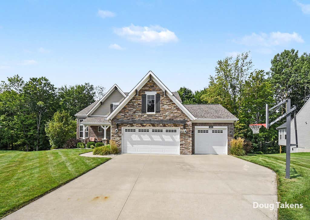 Photo of 9413 Sunset Ridge Drive NE, Rockford, MI 49341 (MLS # 26043068)