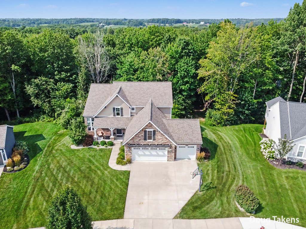 Photo of 9413 Sunset Ridge Drive NE, Rockford, MI 49341 (MLS # 26043068)