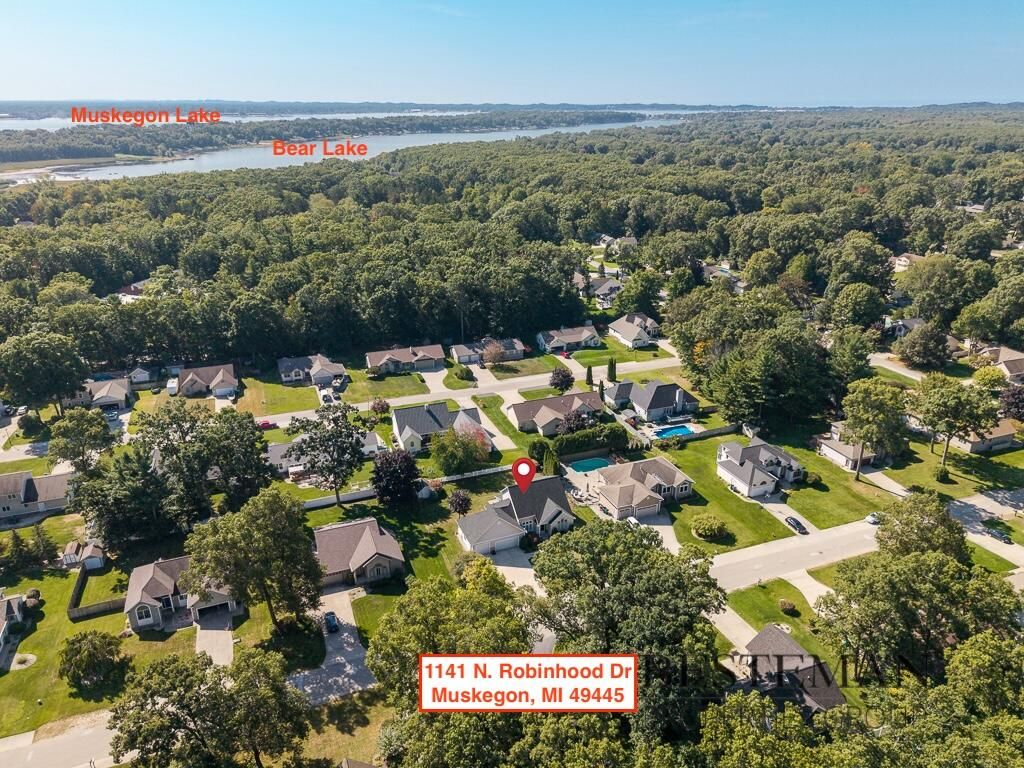 Photo of 1141 N Robinhood Drive, Muskegon, MI 49445 (MLS # 25049019)