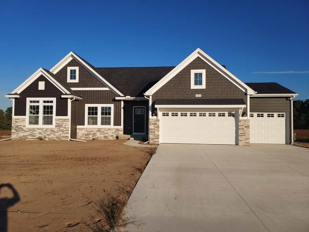 Photo of 9413 Snow Valley Drive SE, Alto, MI 49302 (MLS # 25051421)