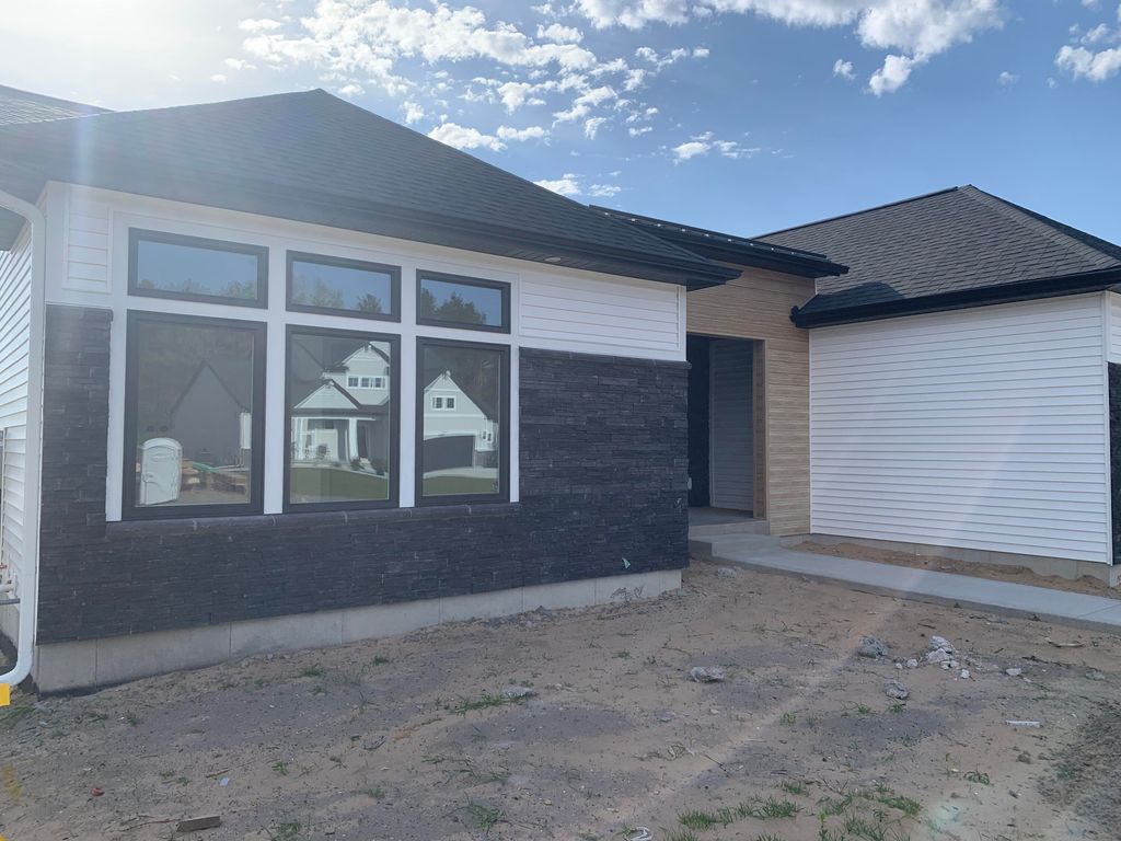 Photo of 12570 Riverton Road, Grand Haven, MI 49417 (MLS # 26021587)