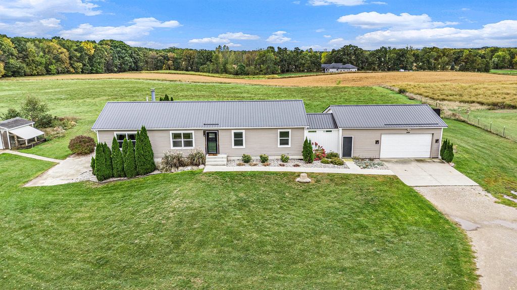 Photo of 9700 7 Mile Road NE, Rockford, MI 49341 (MLS # 25051801)