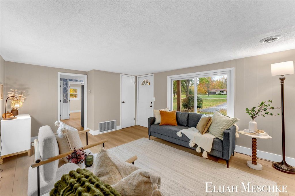 Photo of 5760 Sunfish Lake Avenue NE, Rockford, MI 49341 (MLS # 25054777)