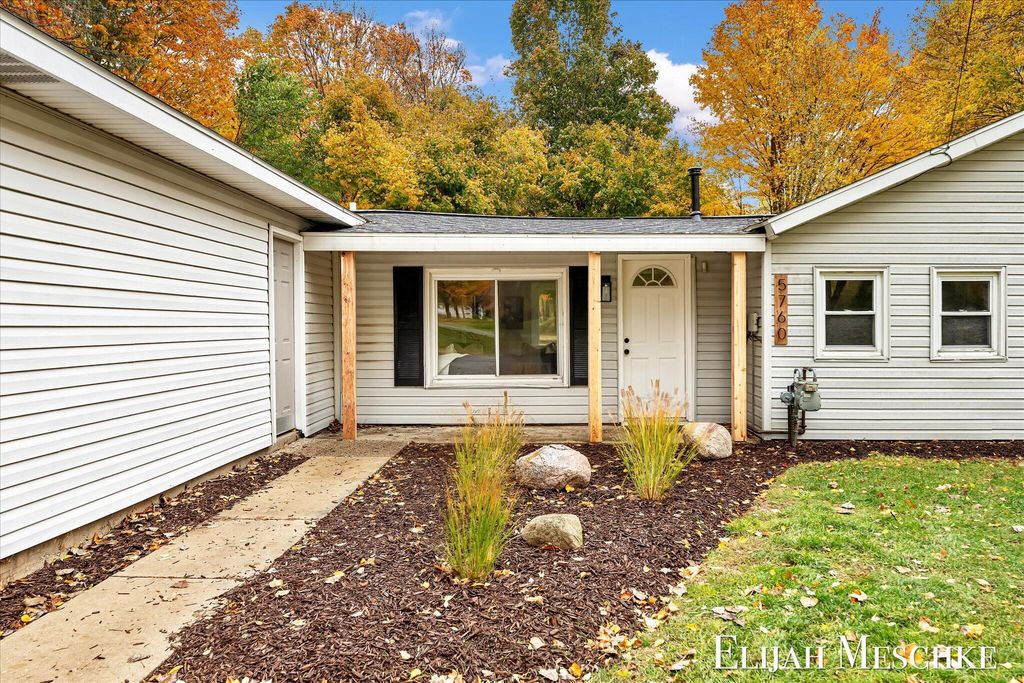 Photo of 5760 Sunfish Lake Avenue NE, Rockford, MI 49341 (MLS # 25054777)