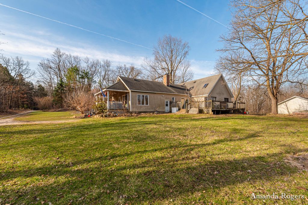 Photo of 14047 4 Mile Road NE, Lowell, MI 49331 (MLS # 26012535)