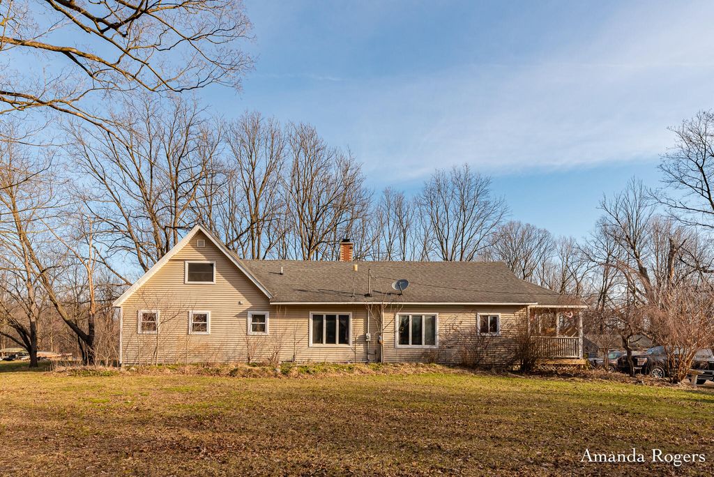 Photo of 14047 4 Mile Road NE, Lowell, MI 49331 (MLS # 26012535)