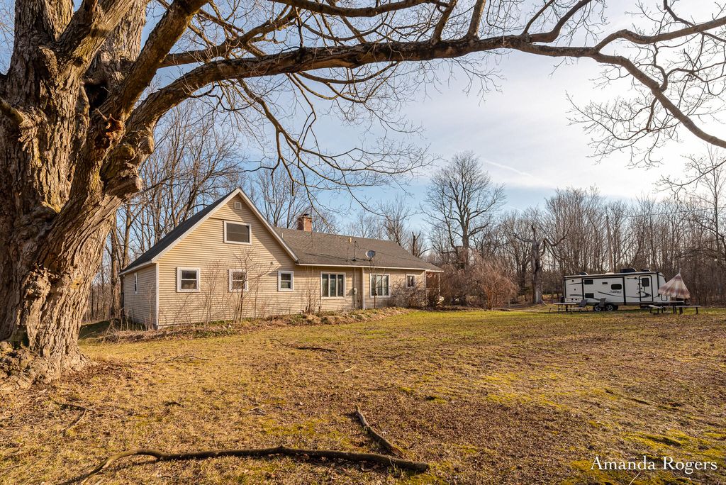 Photo of 14047 4 Mile Road NE, Lowell, MI 49331 (MLS # 26012535)