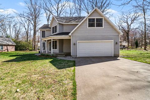 Photo of 1854 Tall Oaks Drive W, Ludington, MI 49431 (MLS # 26007943)