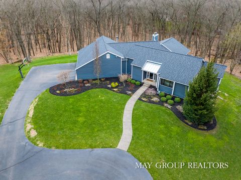 Photo of 8355 Wilderness Trail NE, Ada, MI 49301 (MLS # 26017593)