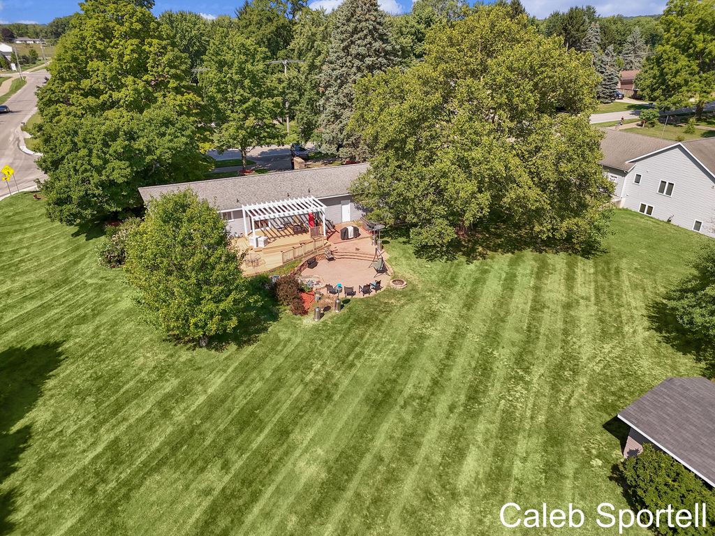 Photo of 6812 Brewer Avenue NE, Rockford, MI 49341 (MLS # 25051937)