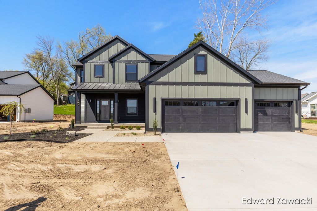 Photo of 397 Rogue River View Drive, Rockford, MI 49341 (MLS # 26019995)