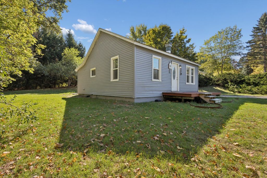 Photo of 9080 Old Belding Road NE, Rockford, MI 49341 (MLS # 25052342)