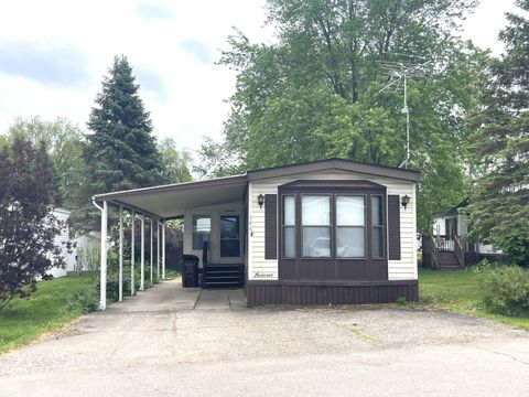 Photo of 855 W Jefferson Street #146, Grand Ledge, MI 48837 (MLS # 26023413)