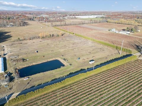 Photo of V/L 112th ave, West Olive, MI 49460 (MLS # 25059364)