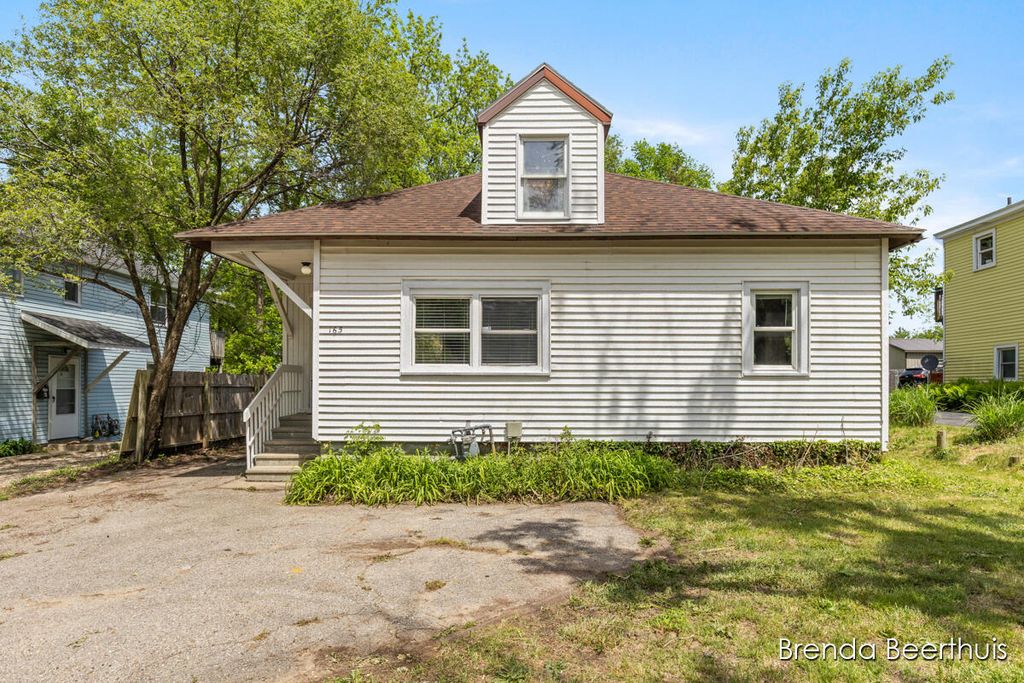 Photo of 165 E Division Street NE, Rockford, MI 49341 (MLS # 26025247)
