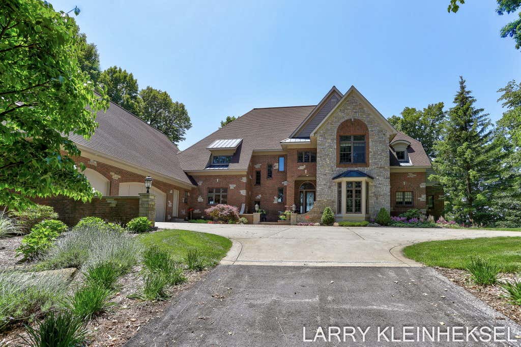 Photo of 5645 N Lakeshore Drive, Holland, MI 49424 (MLS # 26035155)