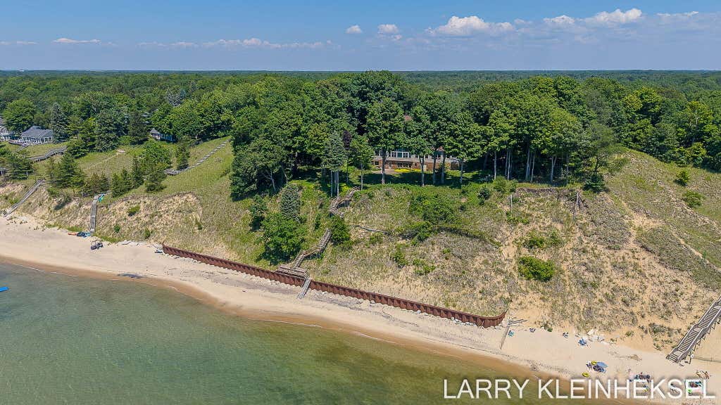 Photo of 5645 N Lakeshore Drive, Holland, MI 49424 (MLS # 26035155)