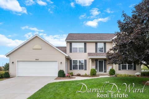 Photo of 7665 Golf Meadows Drive DR SE, Caledonia, MI 49316 (MLS # 26021821)