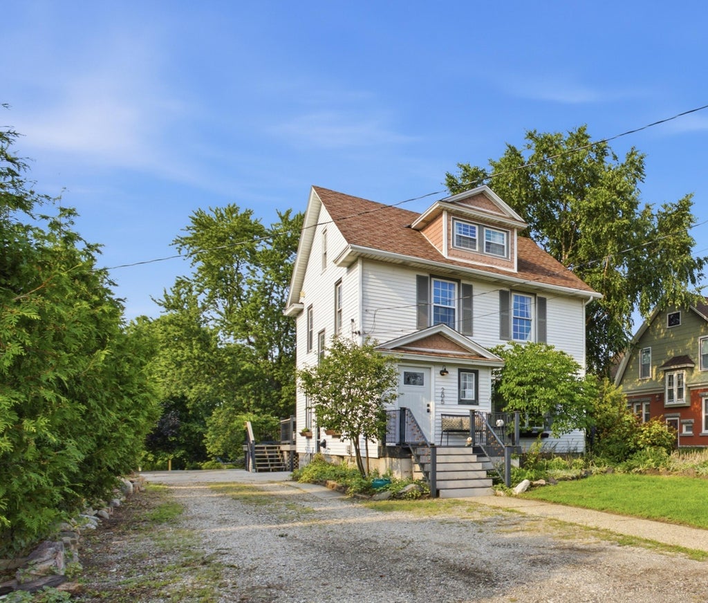 Photo of 205 E Savidge Street, Spring Lake, MI 49456 (MLS # 26043650)