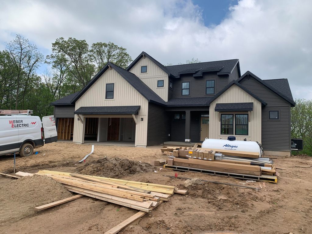 Photo of 6557 Ravine Pt Drive NE, Rockford, MI 49341 (MLS # 26024409)