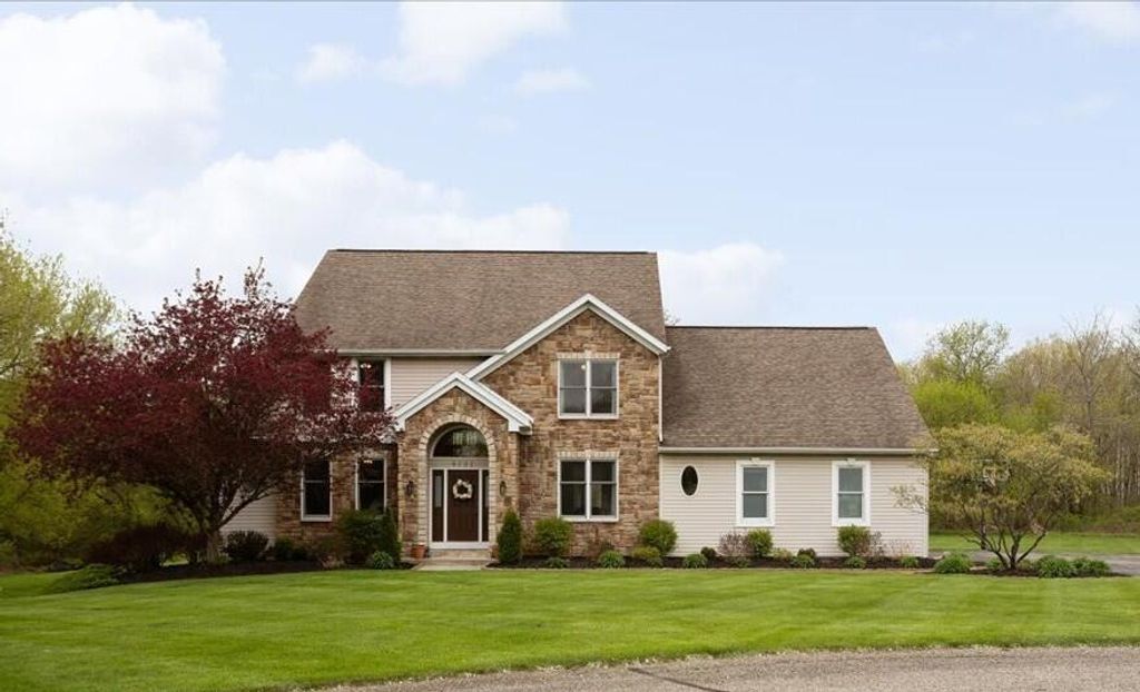 Photo of 4797 Sunflower Ridge Drive NE, Ada, MI 49301 (MLS # 26018553)