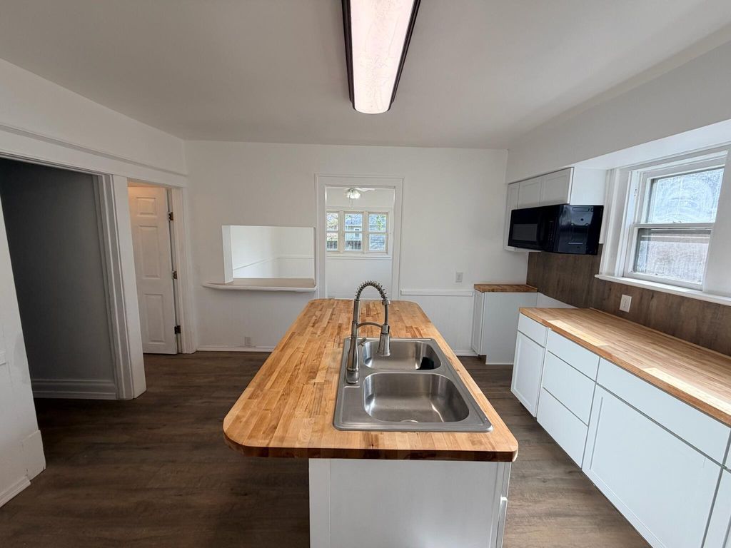 Photo of 1045 E Forest Avenue, Muskegon, MI 49442 (MLS # 26017895)