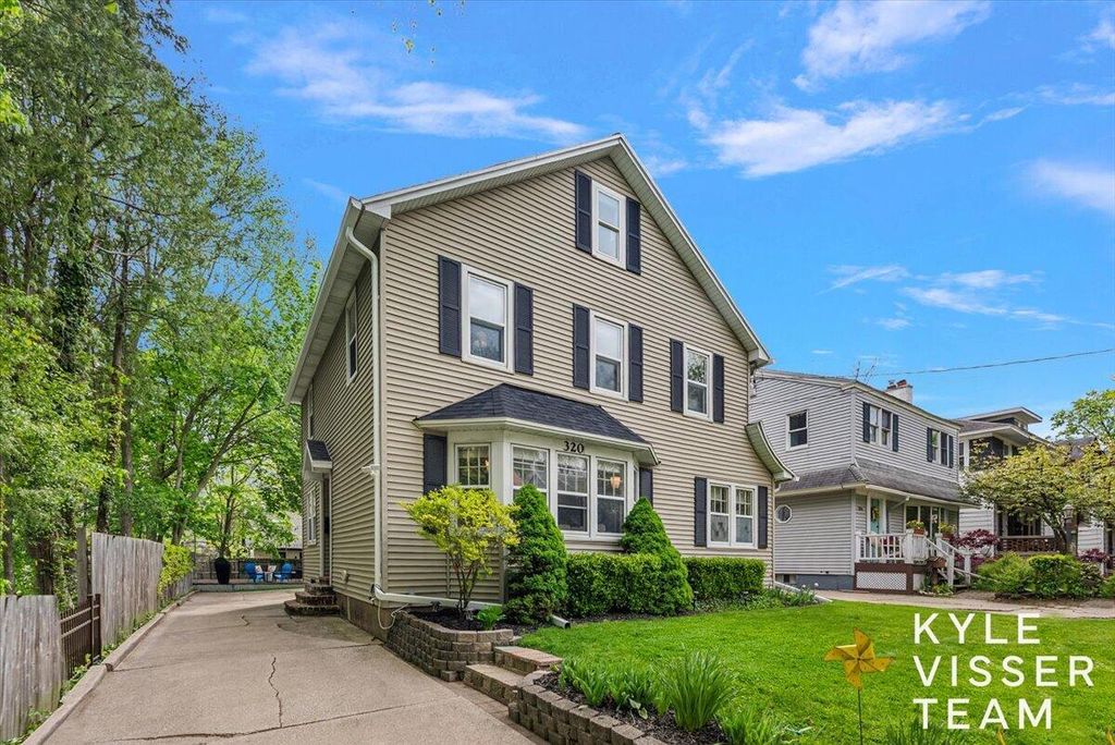 Photo of 320 Gladstone Drive SE, East Grand Rapids, MI 49506 (MLS # 26023097)