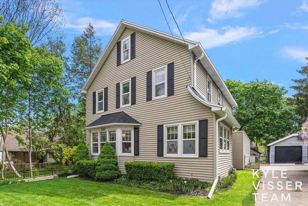 Photo of 320 Gladstone Drive SE, East Grand Rapids, MI 49506 (MLS # 26023097)