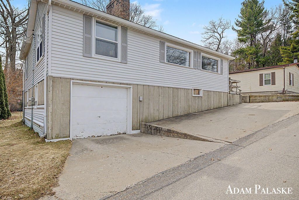 Photo of 8457 Brower Lake Drive NE, Rockford, MI 49341 (MLS # 26011831)