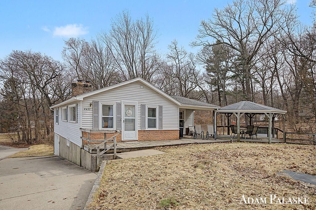 Photo of 8457 Brower Lake Drive NE, Rockford, MI 49341 (MLS # 26011831)