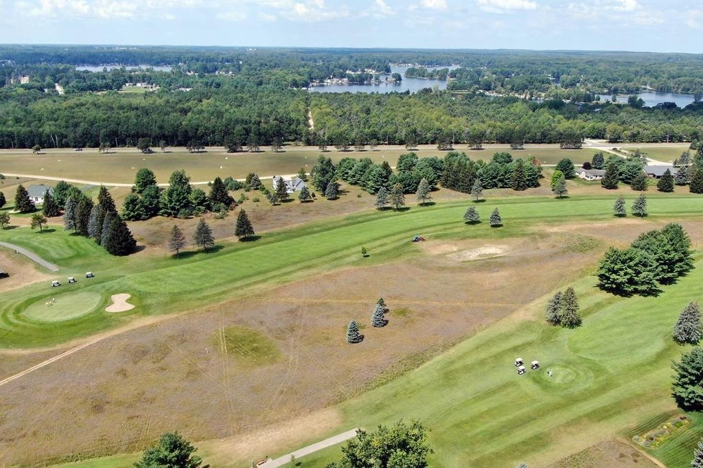 Photo of 9772 Kellys Ct. #Lot 96, Canadian Lakes, MI 49346 (MLS # 26005792)