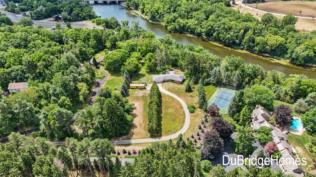 Photo of 311 Honey Creek Avenue SE, Ada, MI 49301 (MLS # 26043398)