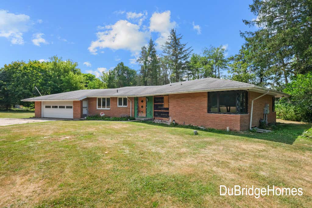 Photo of 311 Honey Creek Avenue SE, Ada, MI 49301 (MLS # 26043398)