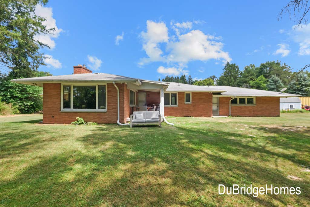 Photo of 311 Honey Creek Avenue SE, Ada, MI 49301 (MLS # 26043398)
