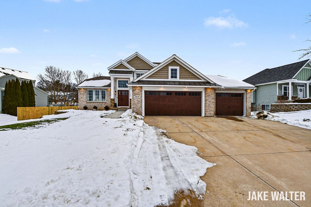 Photo of 5314 S Silverstone Drive NE, Comstock Park, MI 49321 (MLS # 26005148)