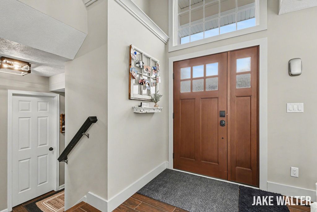 Photo of 5314 S Silverstone Drive NE, Comstock Park, MI 49321 (MLS # 26005148)