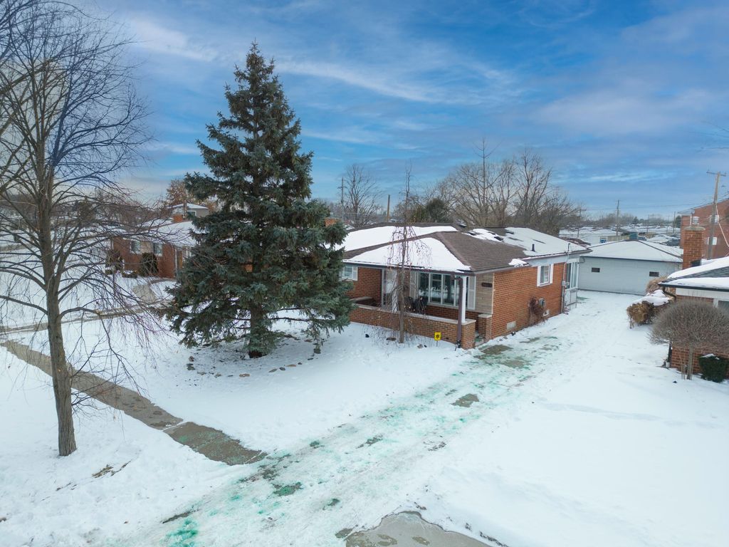 Photo of 34617 Greentrees Road, Sterling Heights, MI 48312 (MLS # 26005237)