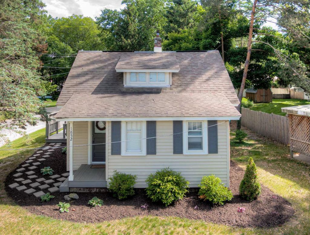 Photo of 1852 S Shore Drive, Holland, MI 49423 (MLS # 25054146)