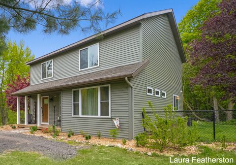 Photo of 10451 Pine Island Drive NE, Sparta, MI 49345 (MLS # 26021919)