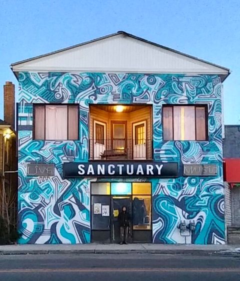 Photo of 2932 Caniff Street, Hamtramck, MI 48212 (MLS # 25060939)