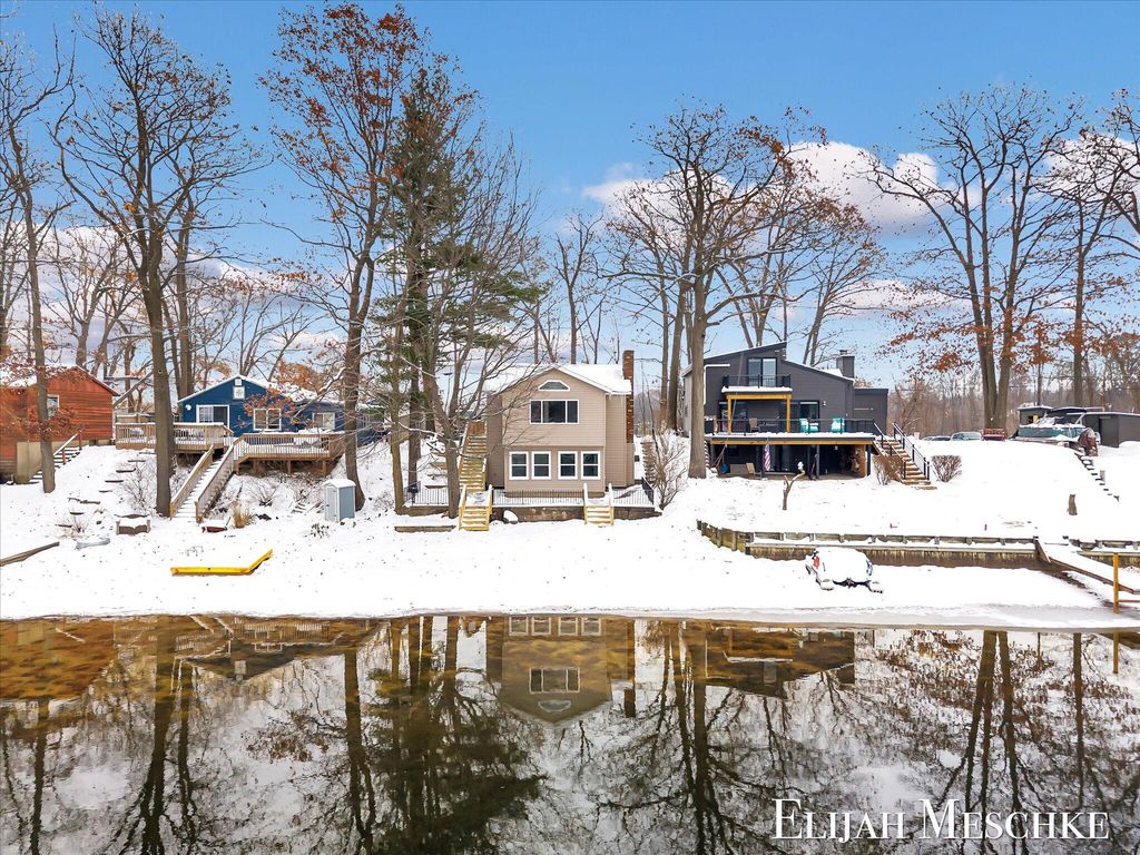 Photo of 10463 Poplar Drive NE, Rockford, MI 49341 (MLS # 25060781)