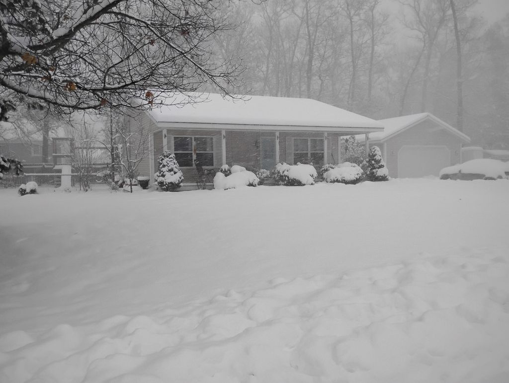 Photo of 1250 Woodridge Street, Muskegon, MI 49442 (MLS # 25060318)