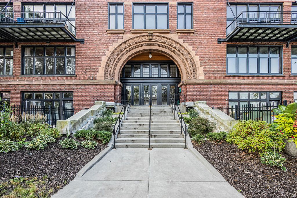 Photo of 600 Broadway Avenue NW #203, Grand Rapids, MI 49504 (MLS # 22051636)