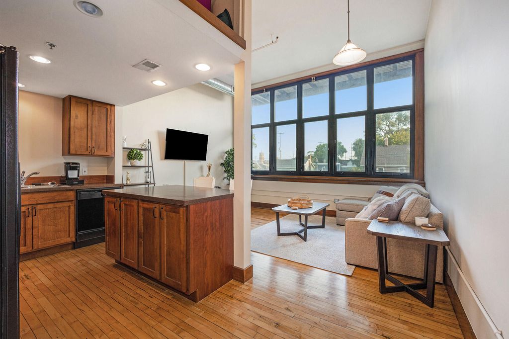 Photo of 600 Broadway Avenue NW #203, Grand Rapids, MI 49504 (MLS # 22051636)