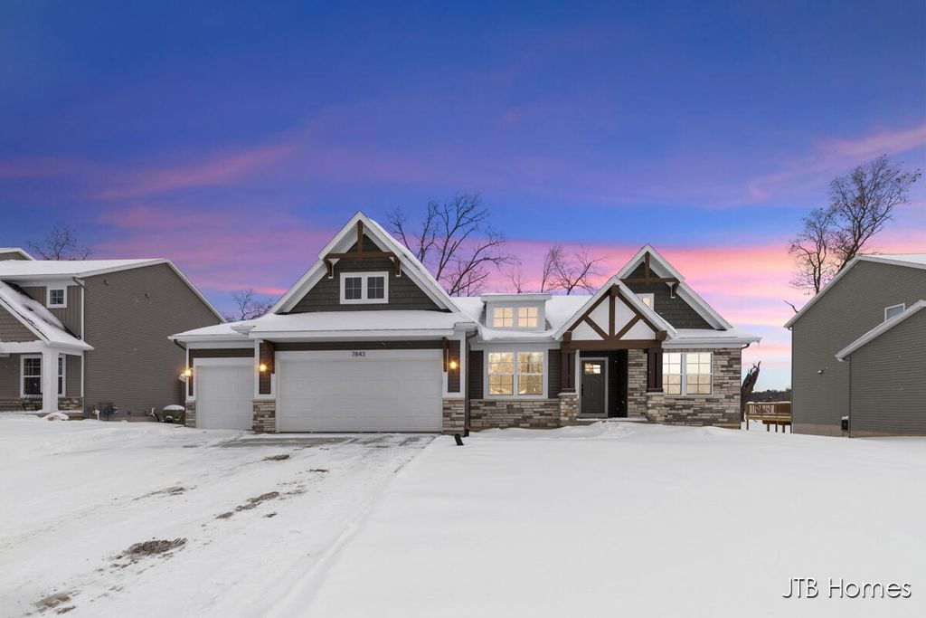 Photo of 7843 Woodhurst Drive NE, Rockford, MI 49341 (MLS # 25052986)